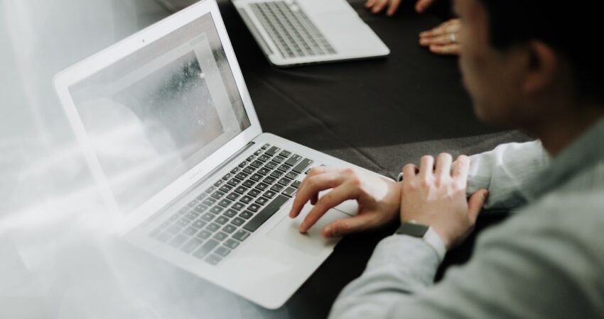 Developer Reviewing A Friend-Built Website That Needs Proper Hosting
